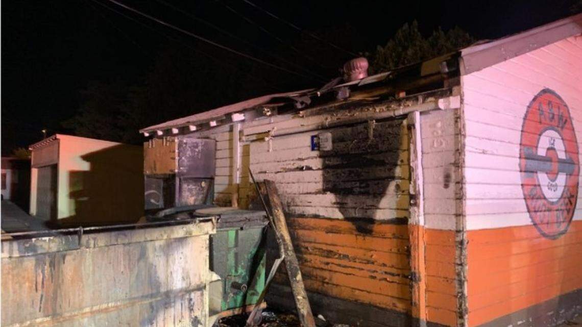 One of several dumpster fires early Monday, June 28, 2021, in downtown Modesto spread to the storage building of the A&W restaurant on G Street.