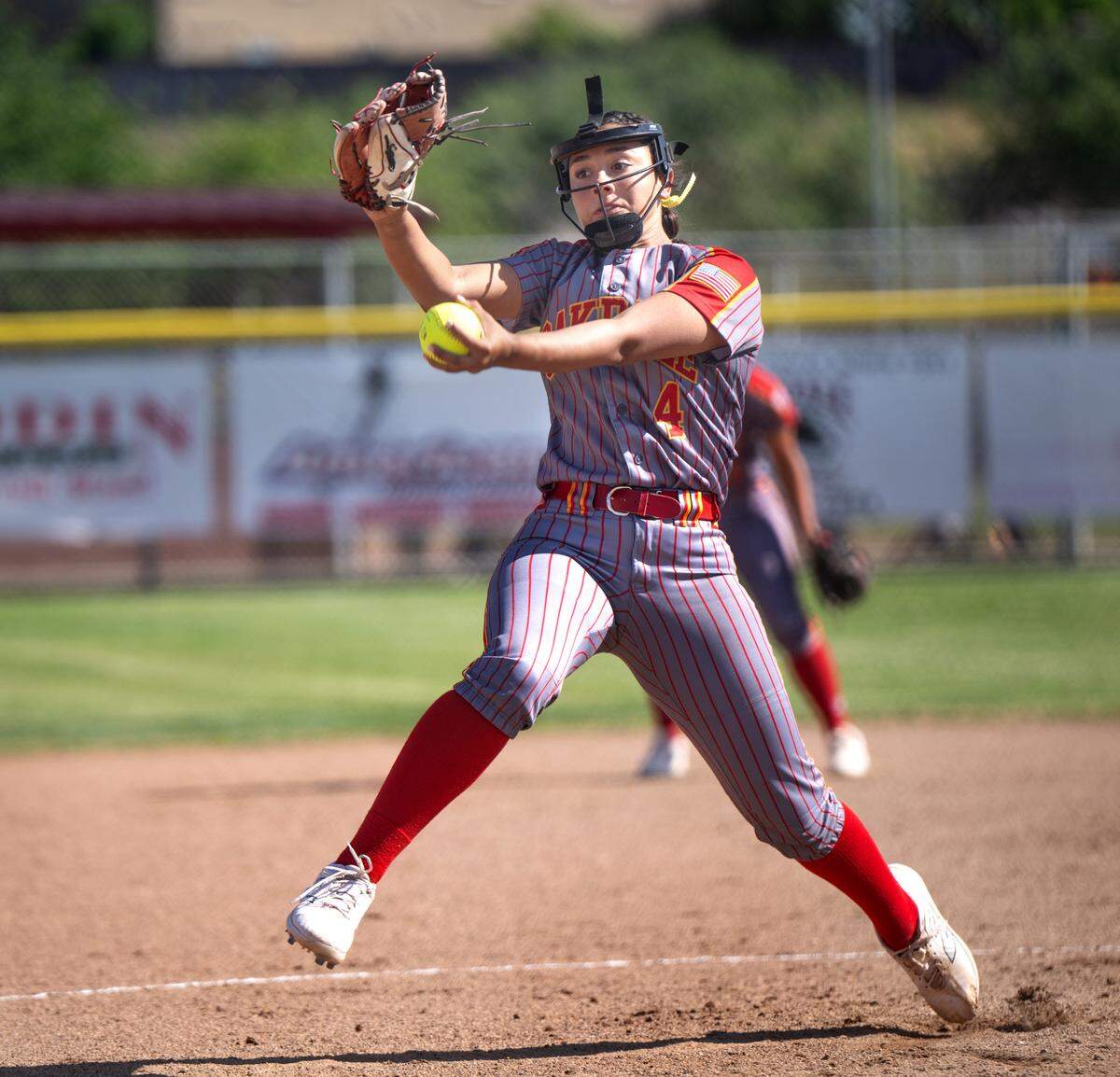 Oakdale’s Jaelyn Lee delivers a pitch during the Valley Oak League game with Manteca at Oakdale High School in Oakdale, Tuesday, April 29, 2025.