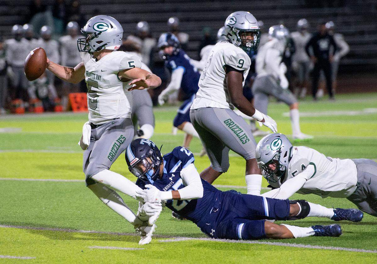 Downey’s Derrick Kirkendall sacks Granite Bay quarterback McCade Long during the CIF Sac-Joaquin Section Division II playoff game at Downey High School in Modesto, Calif., Friday, Nov.11, 2022.