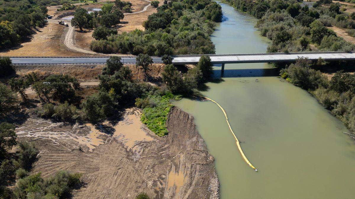 A dredging pit was filled in to reestablish a low flood plain (bottom left) as part of the Basso/La Grange floodplain and spawning habitat restoration project along the Tuolumne River in La Grange, Calif., Thursday, Sept. 12, 2024.