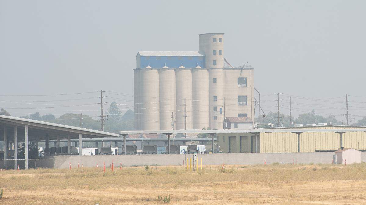 Smoke hangs over Modesto, Calif., on Wednesday, July 28, 2021.
