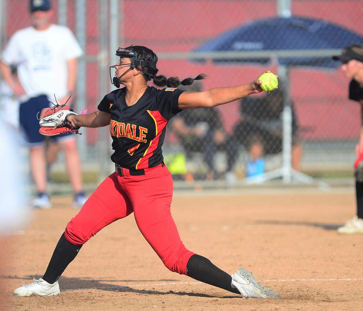 Oakdale pitcher Jaelyn Lee (4) throws a pitch during a game between Oakdale and Central Catholic at Oakdale High School in Oakdale, Calif. on April 17, 2024. Central Catholic won 6-2.