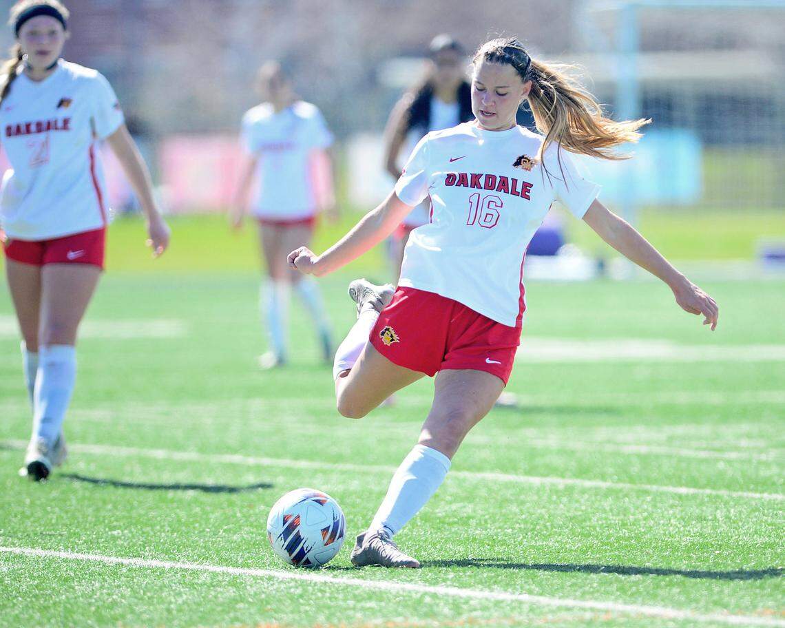 Oakdale’s Ceci Cotton (16) kicks the ball up field during the Sac-Joaquin Section Division III Championship between Oakdale High School and Roseville High School at Cosumnes River College in Sacramento, Calif. on Saturday, March 1, 2025.
