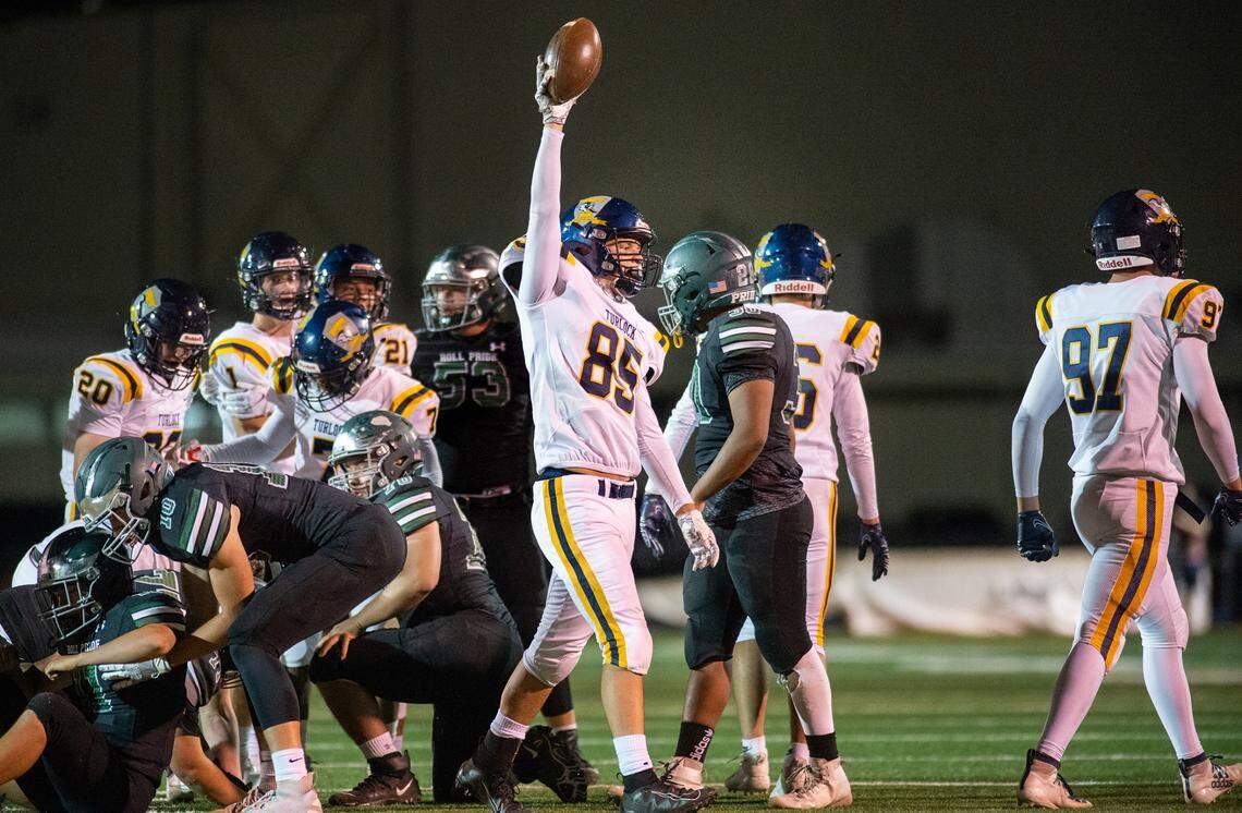 Turlock’s David Salazar recovers a fumble during the Central California Athletic League game with Pitman at Turlock High School in Turlock, Calif., on Thursday, April 16, 2021. Turlock won the game 49-7.