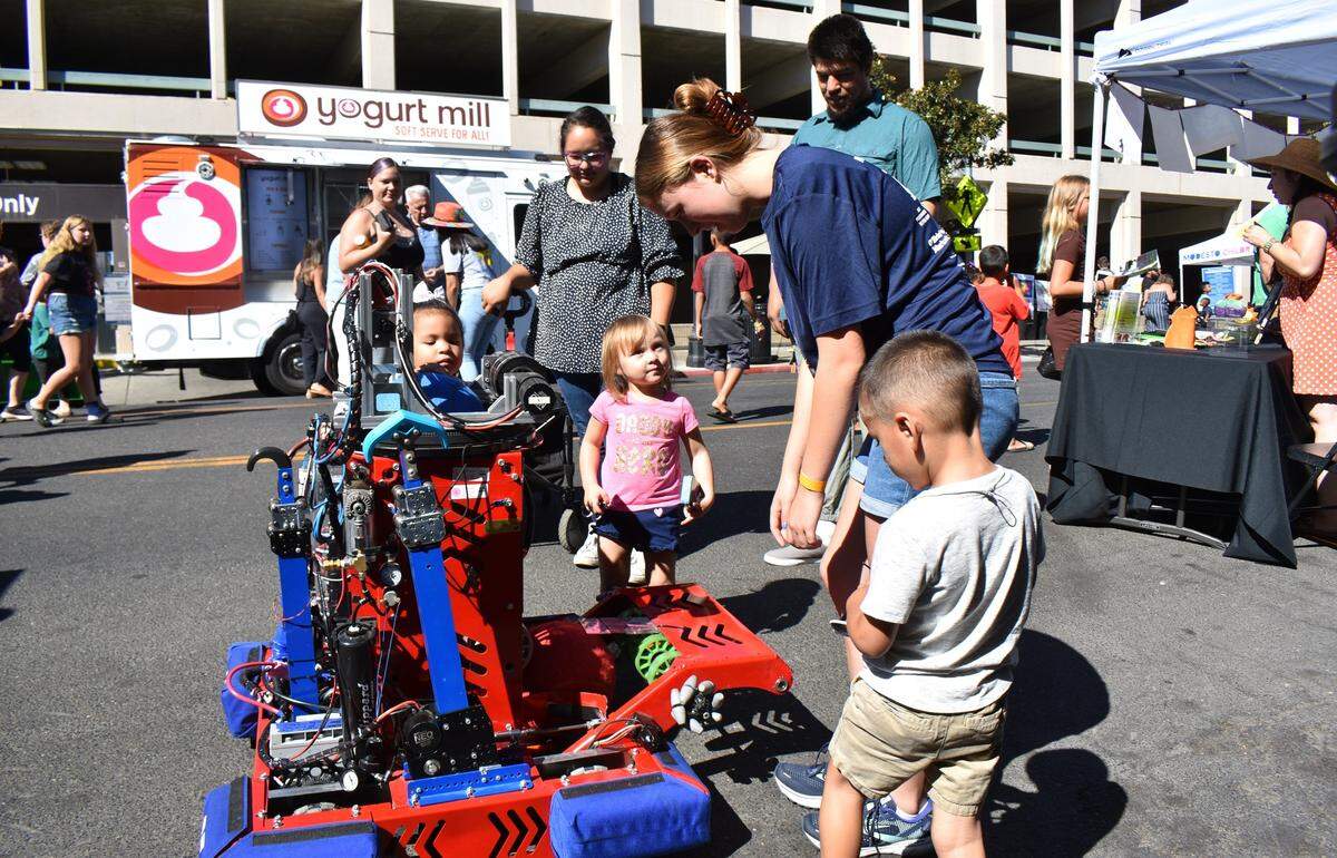 The Beyer High School Iron Patriots robotics team added to the fun at the Modesto Children’s Museum’s Launch the Adventure street festival on 11th Street downtown Saturday, Aug. 13, 2022.