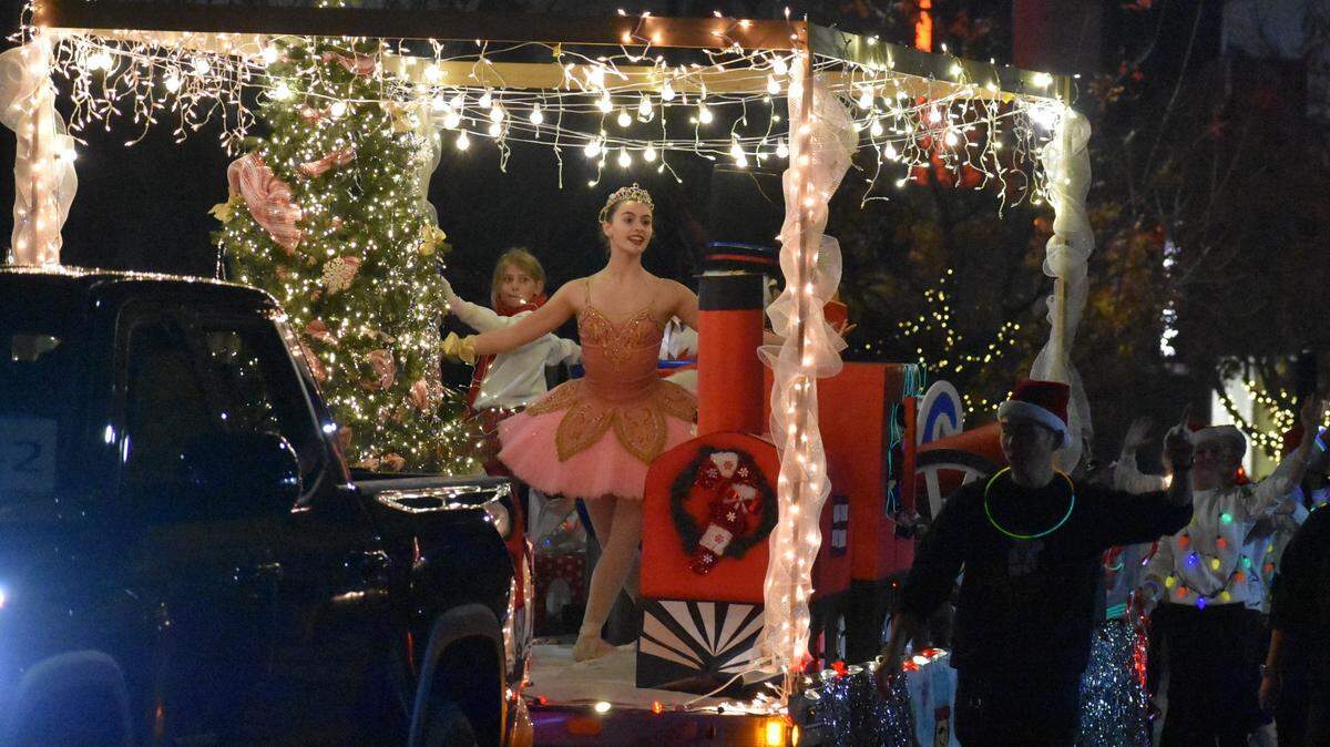 The Celebration of Lights Parade made its way along the streets of downtown Modesto on Saturday night, Dec. 2, 2023, to the theme Toys, Trains and Candy Canes.
