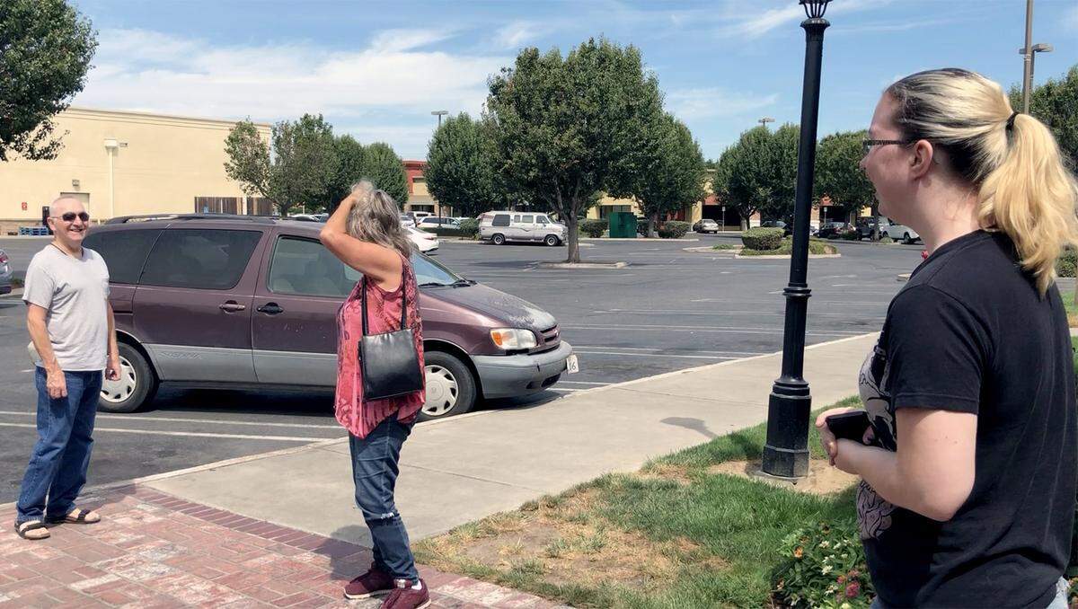 Marie Callender’s former employee Dakota Wallers (right) tells customers of the restaurant’s closing on Monday August 5, 2019 in Modesto, Calif.