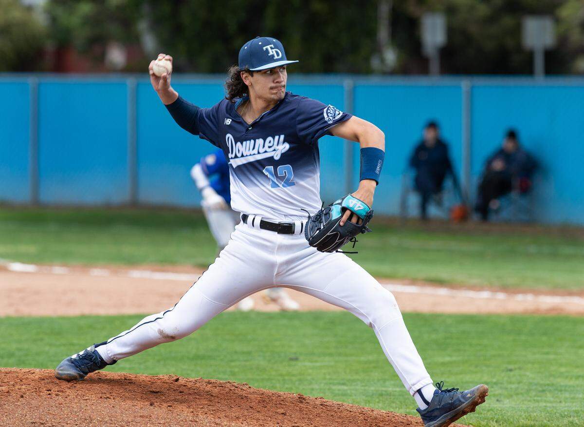 Downey’s Jaxen Rowland pitches the ball during the Central California Athletic league game with Turlock at Downey High School in Modesto, Calif., Thursday, March 23, 2023.