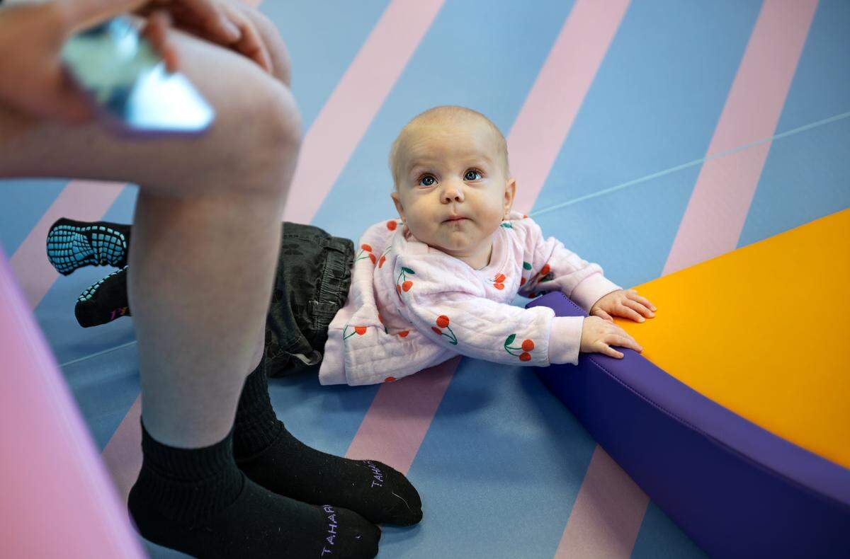 Seven-month-old Sawyer Anaya crawls around in the play area for kids 24 months and younger at the Play Turlock indoor playground on Monday, Nov. 3, 2025.