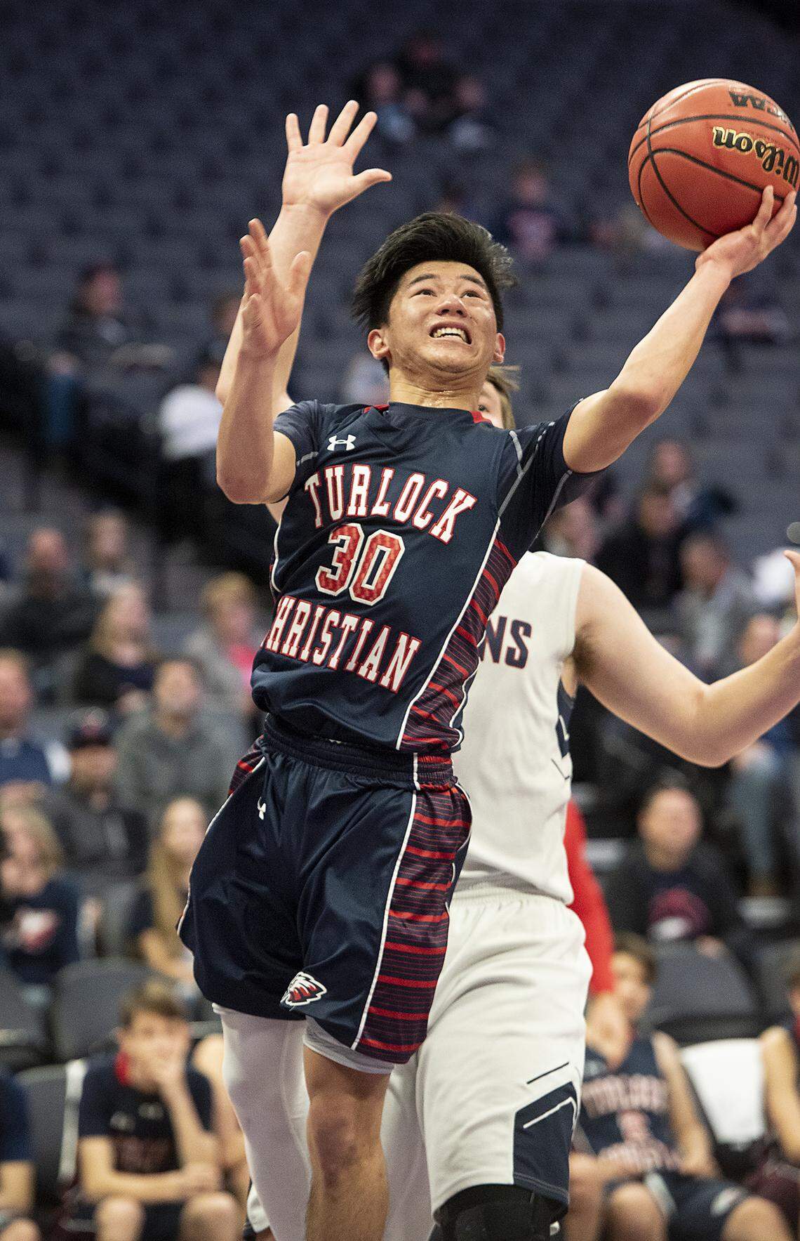 Turlock Christian’s Jack Silva scores during the Sac-Joaquin Section Division VI boys basketball championship game with Vacaville Christian at the Golden1 Center in Sacramento, Calif., Friday, Feb. 22, 2019.