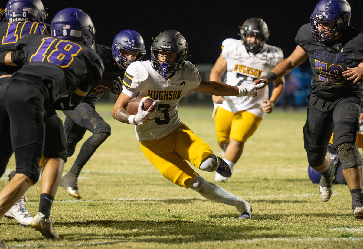Hughson’s Lawson Aviles runs the ball during the Trans-Valley League game with Escalon in Escalon on Friday, Oct. 3, 2025.