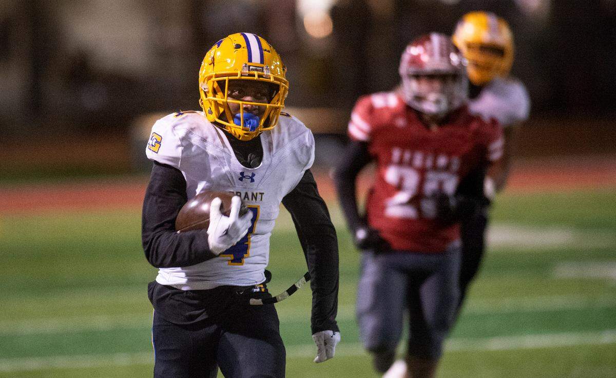 Grant’s Semaj Mafu-Hart breaks free down the sideline for one of his two 60-plus-yard touchdown runs during a Sac-Joaquin Section Division III semifinal with Patterson in Patterson, Calif., Friday, Nov. 18, 2022. Grant won 80-44.