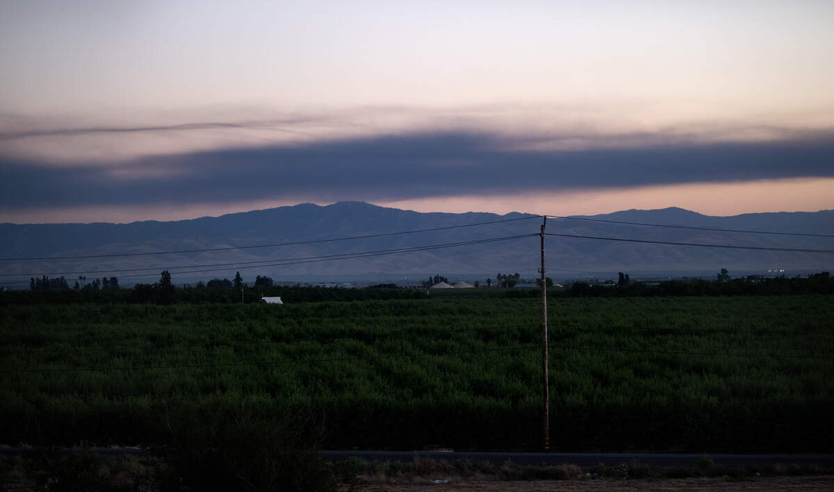 Smoke from a warehouse fire in Tracy blows south along the Diablo Range seen from Salida, Calif., Thursday, June 11, 2026.