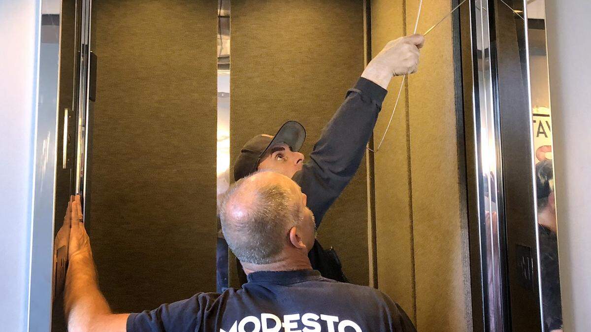 A woman was stuck in an elevator for about a half hour Friday afternoon, June 22, 2018, in the City Tower building, aka the Merrill Lynch building, where the Stanislaus County Superior Court civil division is housed. Firefighters locked open the elevator doors, which were temporarily re-energized, while electricians worked to restore power to the building.