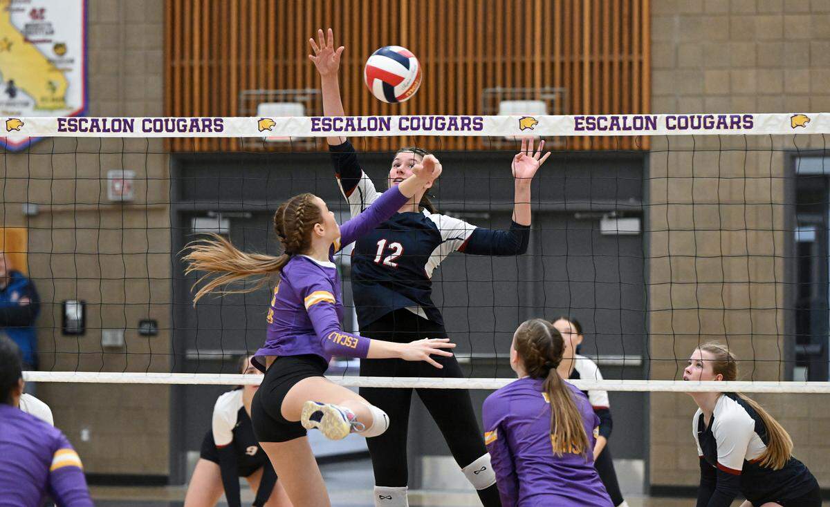 Beyer’s Fallon Freeman strikes the ball past Escalon’s Claire Barkus in D-III quarterfinal playoff match at Escalon High School in Escalon, Calif., Thursday, Oct. 26, 2023. Beyer won 3-1.