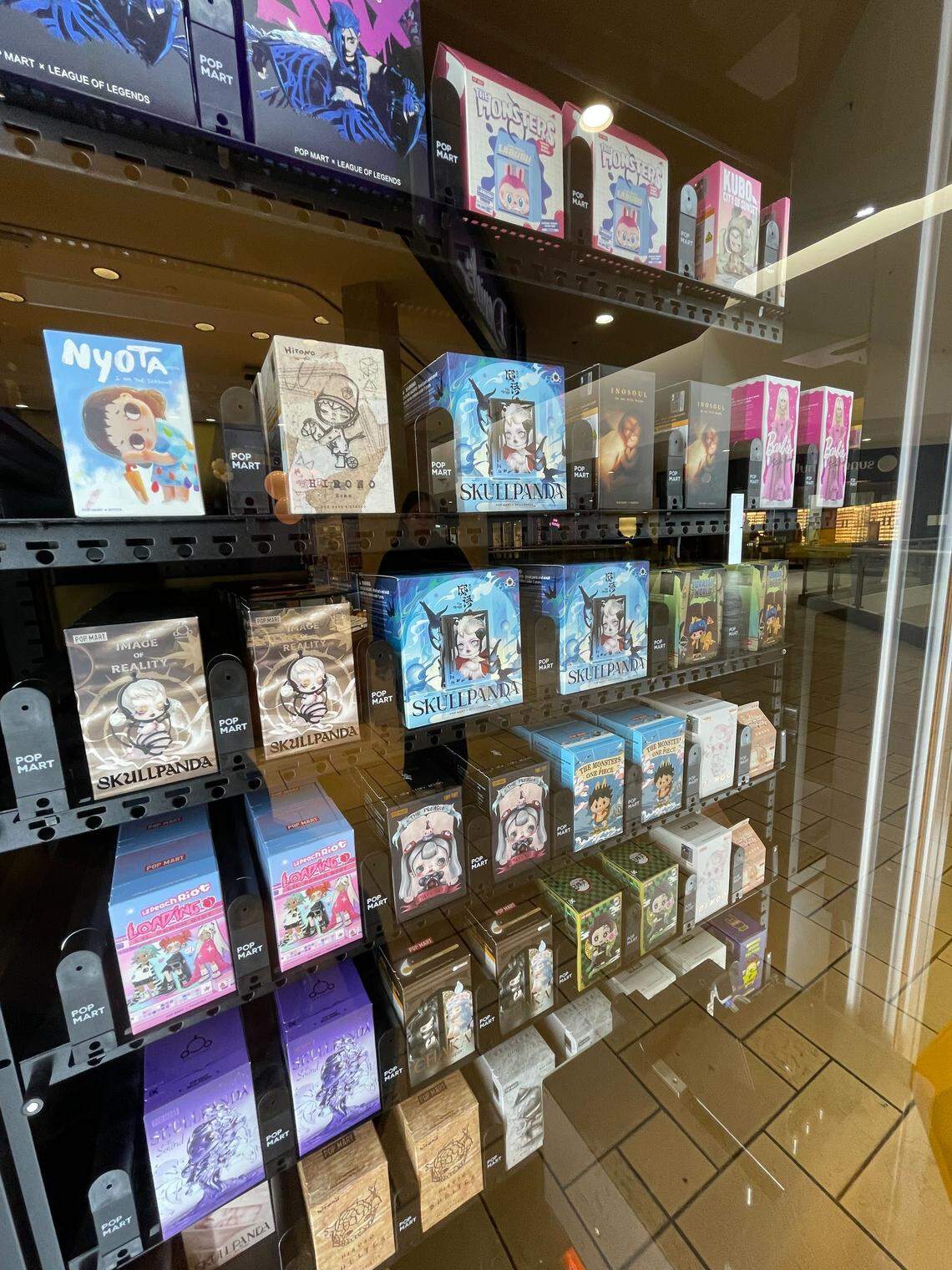 A selection of blind box toys at the new Pop Mart Robo Shop vending machine at  Vintage Faire Mall on Tuesday, Oct. 14.