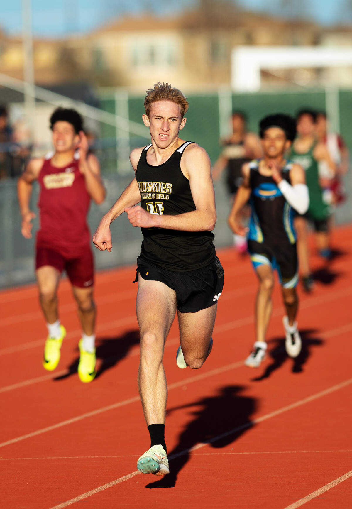 Hughson’s Joe Lighthall runs in the boys 400-meter race during the Stanislaus County track meet at Hughson High School in Hughson, Calif., Friday, March 24, 2023.