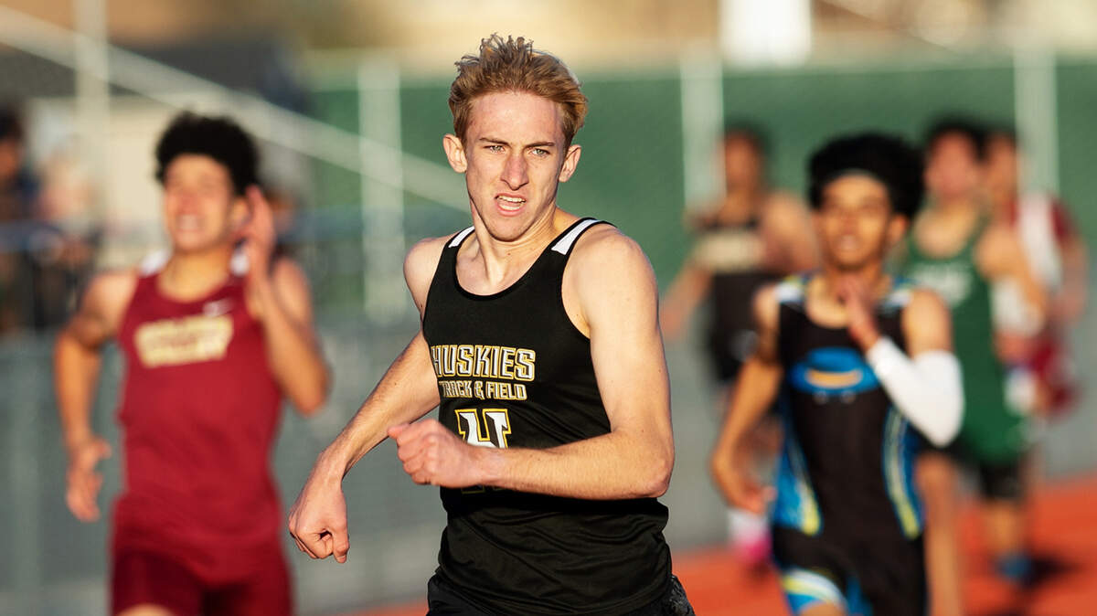 Hughson’s Joe Lighthall runs in the boys 400-meter race during the Stanislaus County track meet at Hughson High School in Hughson, Calif., Friday, March 24, 2023.