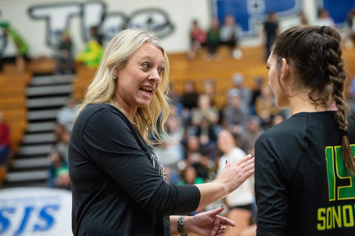 Sonora head coach Amy Wahlbrink talks with Mia Alomia during the Sac-Joaquin Section Division 4 Section final at Modesto Junior College in Modesto, Calif., Saturday, Nov. 5, 2022. Ripon won the title 3-1.