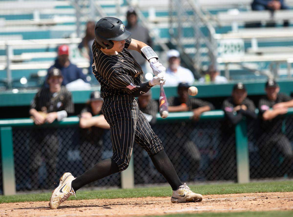 Enochs’ Vincent Gates doubles during the game with Turlock at John Thurman Field in Modesto, Calif., Friday, March 31, 2023.