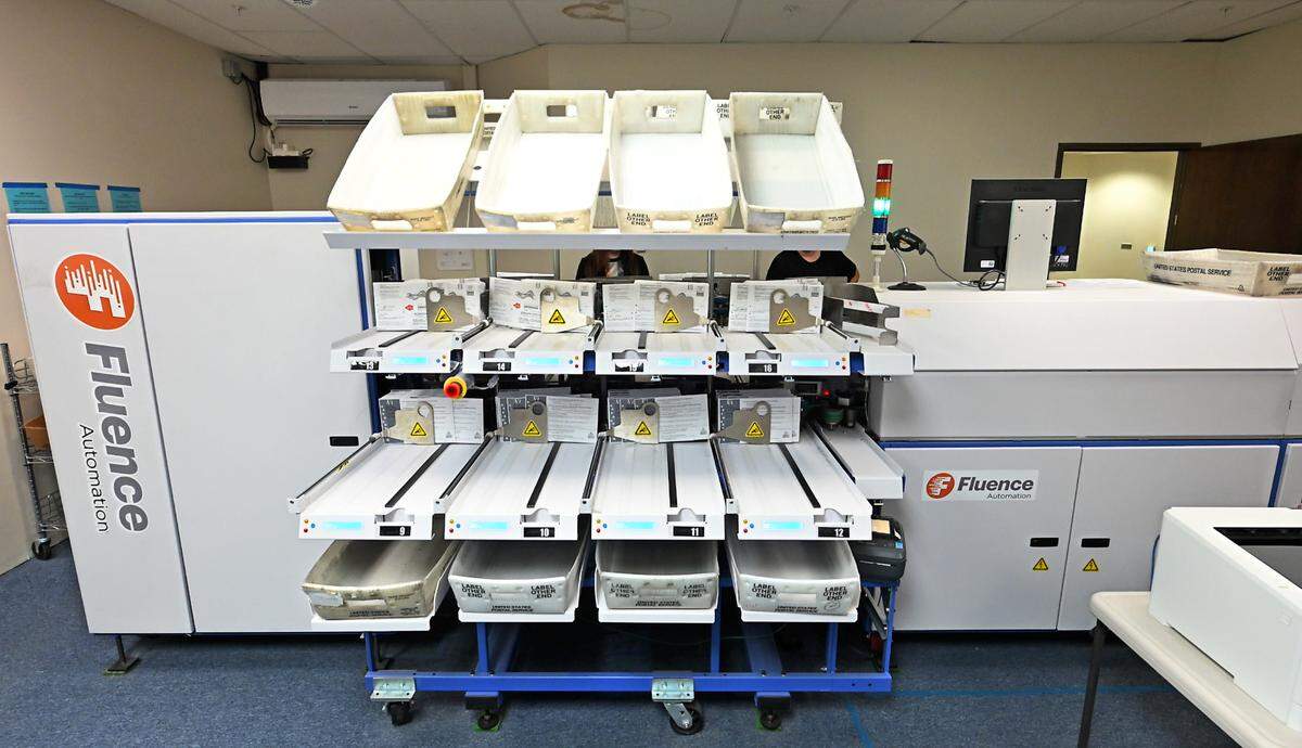 Sorting and signature scanning machine at the Stanislaus County Registrar of Voters Office in Modesto, Wednesday, Oct. 23, 2024.