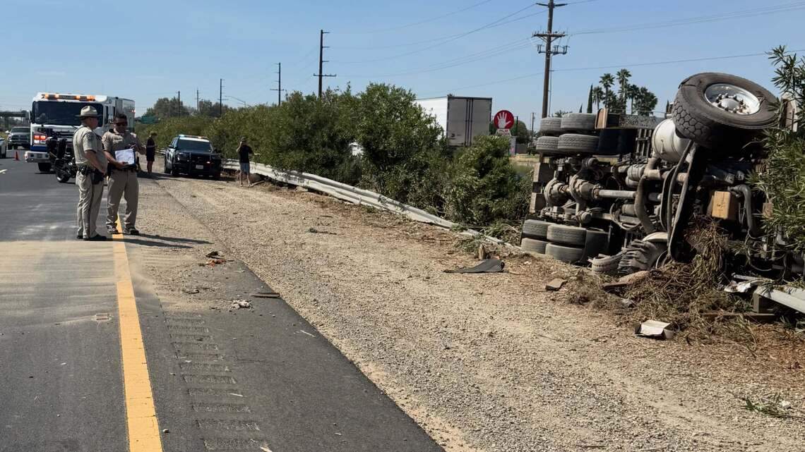 Overturned semi closes lane on southbound Highway 99 near Merced. Traffic delayed