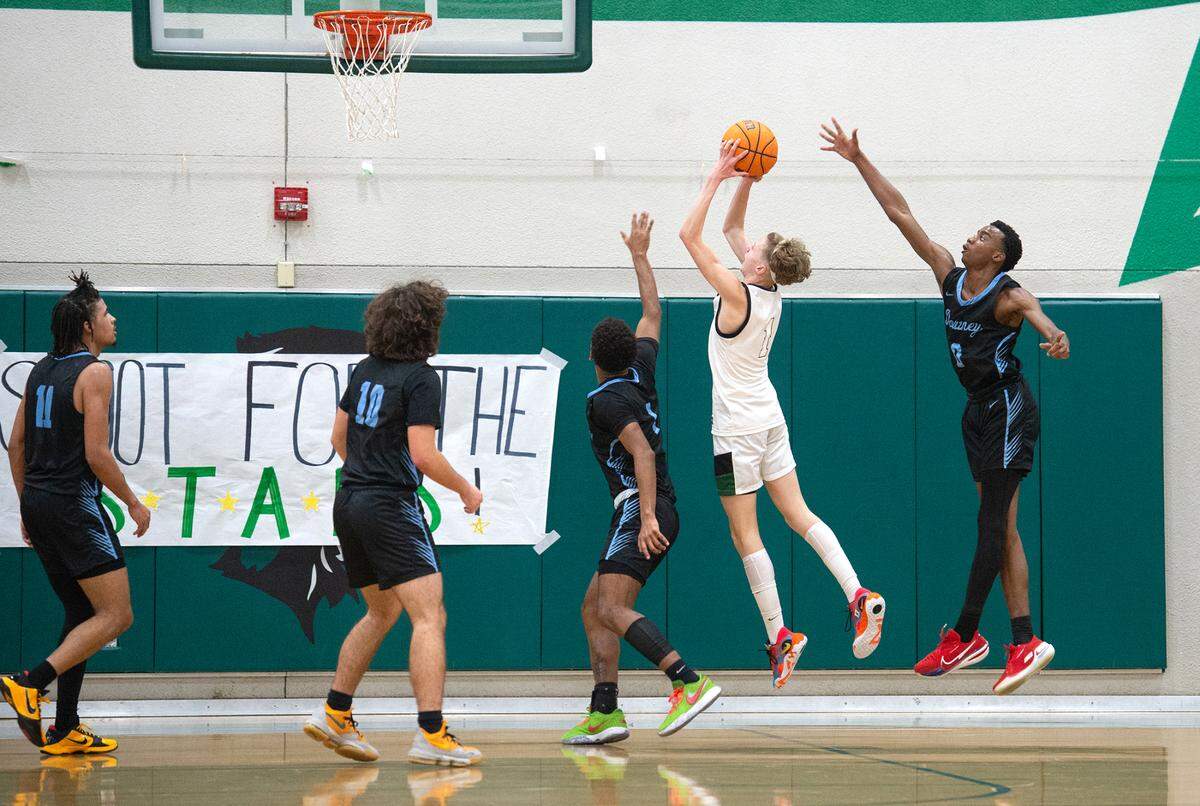 Pitman’s Avery Sanchez scores during the Central California Athletic League game with Downey in Turlock, Calif., Wednesday, Jan. 18, 2023. Downey won the game 52-44.