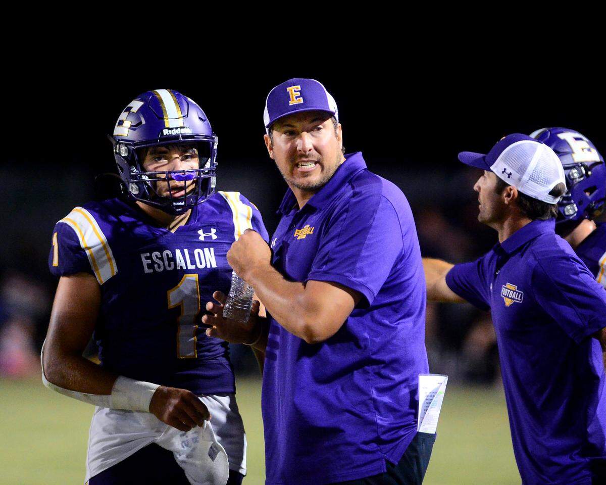 Escalon Head Coach Andrew Beam looks back toward the sideline during a game between Escalon High School and Oakdale High School in Escalon, Calif. on Sept. 6, 2024. Oakdale won the game 21-20 in overtime.