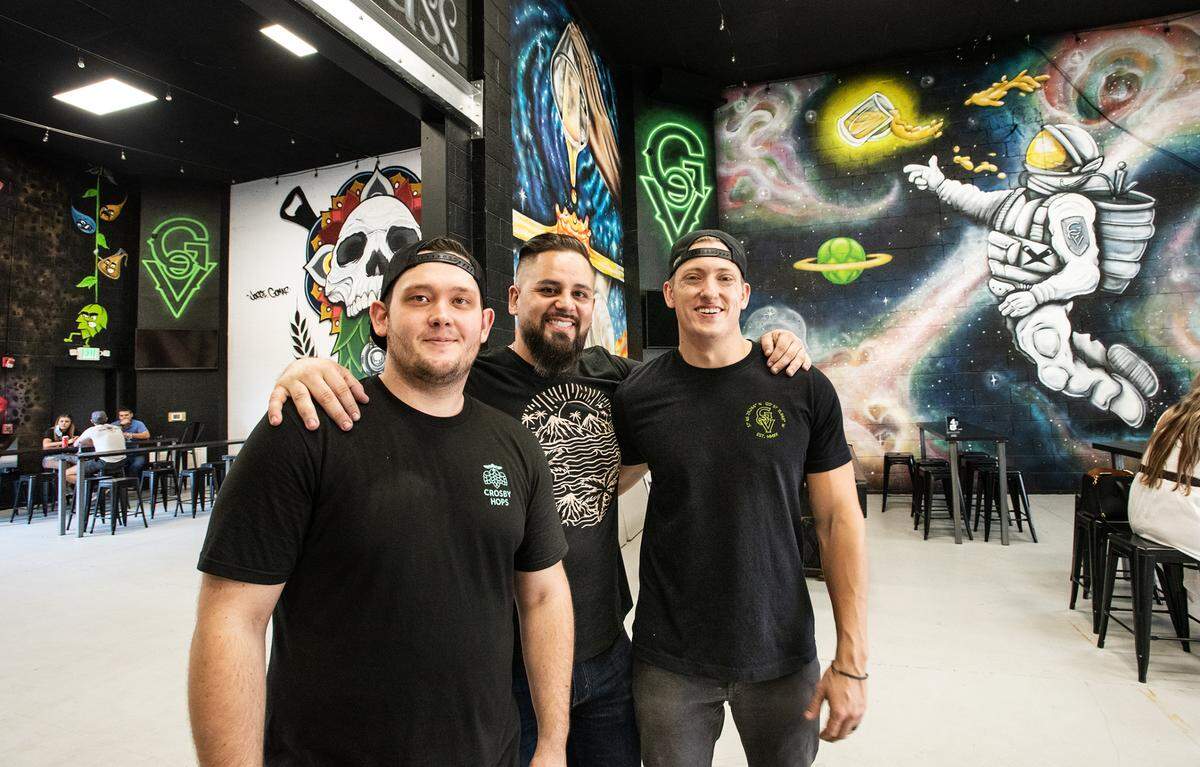 From the left, Matt McCracken, Kris Panelle, and Cory Onken operate Grains of Virtue Brewing Company in Oakdale, Calif., on Thursday Oct. 23, 2020.
