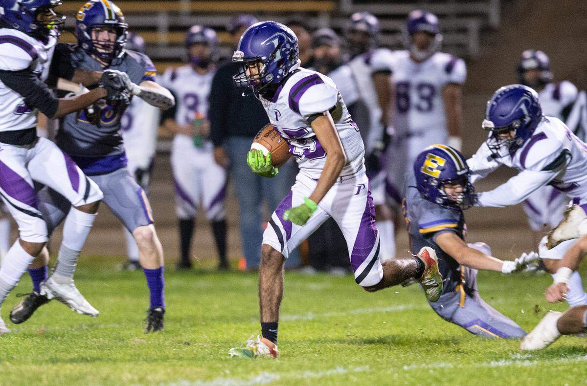 Pacheco’s Daniel Scott returns a kick during the first round playoff game with Escalon in Escalon, Calif., Friday, Nov. 4, 2022.