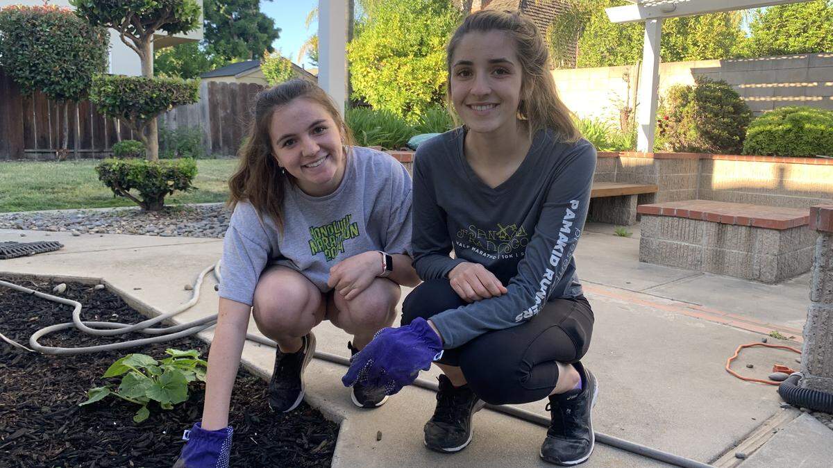 Gregori High senior Jocelyn Fahlen, who will attend Columbia University, enjoys a new quarantine activity, gardening, with her sister, Gregori junior Evelyn Fahlen, right.