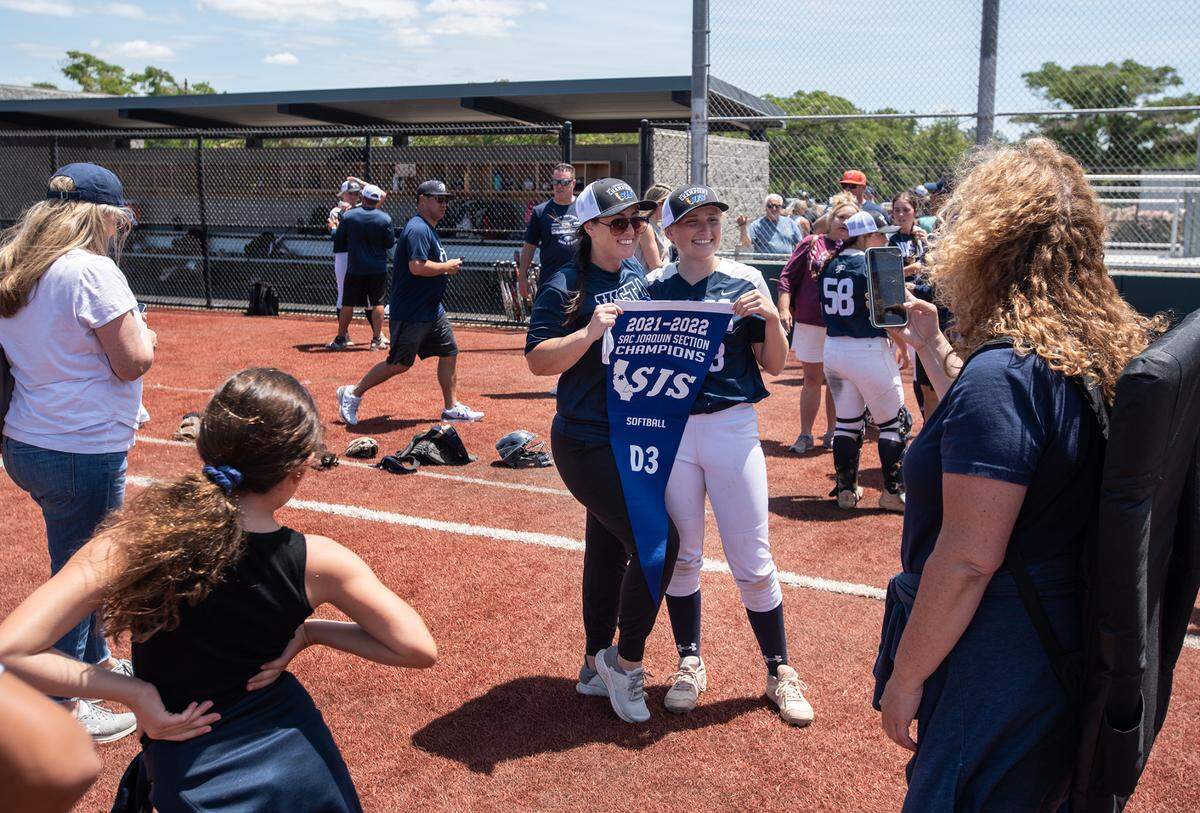 Vista del Lago head coach Julie Lazar and player Lauren Aubrey after their victory over Central Catholic in the CIF Sac-Joaquin Section Division III softball championship game at Delta College in Stockton, Calif., on Saturday, May 28, 2022.