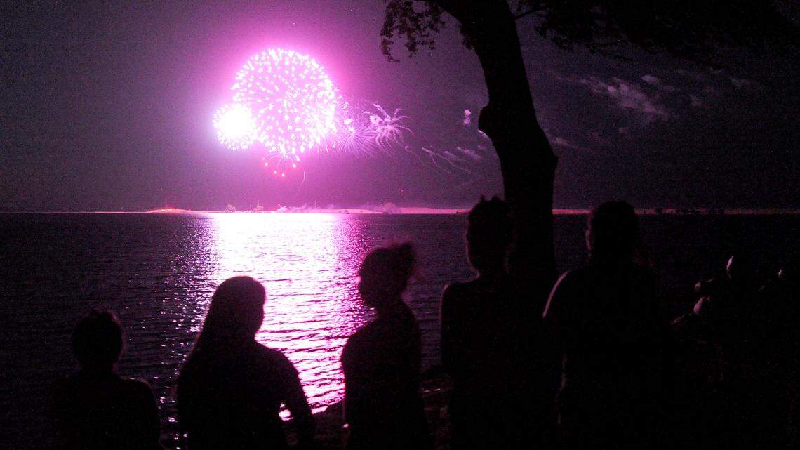 Fireworks go off over Woodward Reservoir during a past year’s Fourth of July celebration.