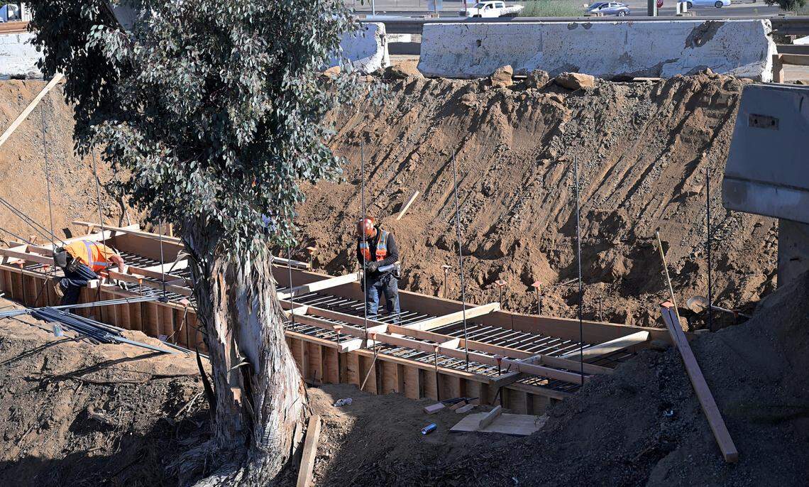 A California Department of Transportation crew is building a retaining wall on the southbound Highway 99 off-ramp at Hatch Road in Ceres, Calif., Tuesday, Sept. 24, 2024. Work is expected to be finished by Sept. 30.