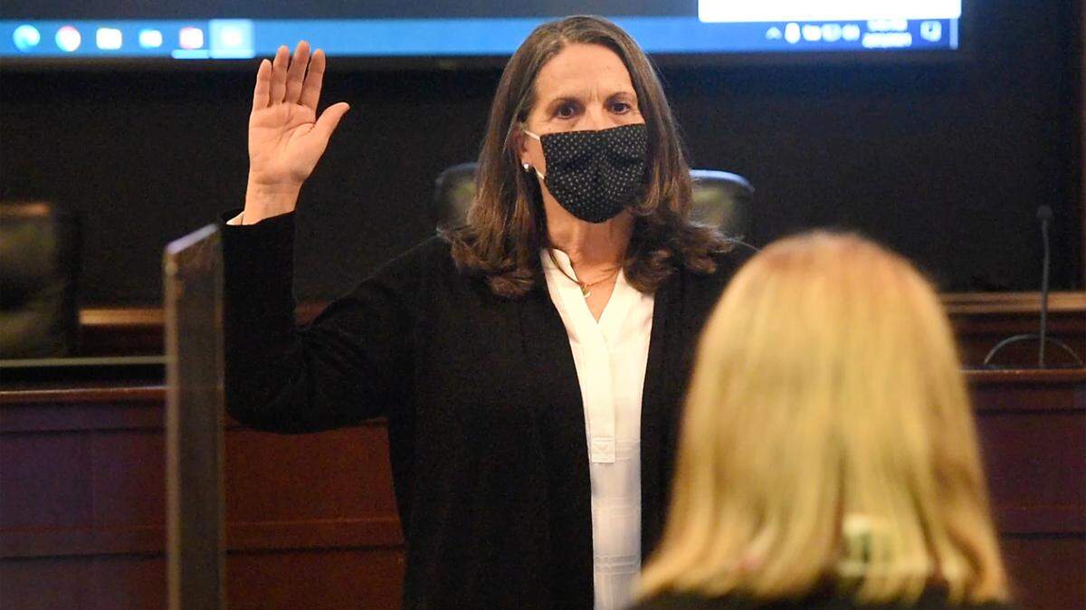 Sue Zwahlen takes the oath of office as mayor during the Modesto City Council meeting in Modesto, Calif., on Tuesday, Feb. 23, 2021.