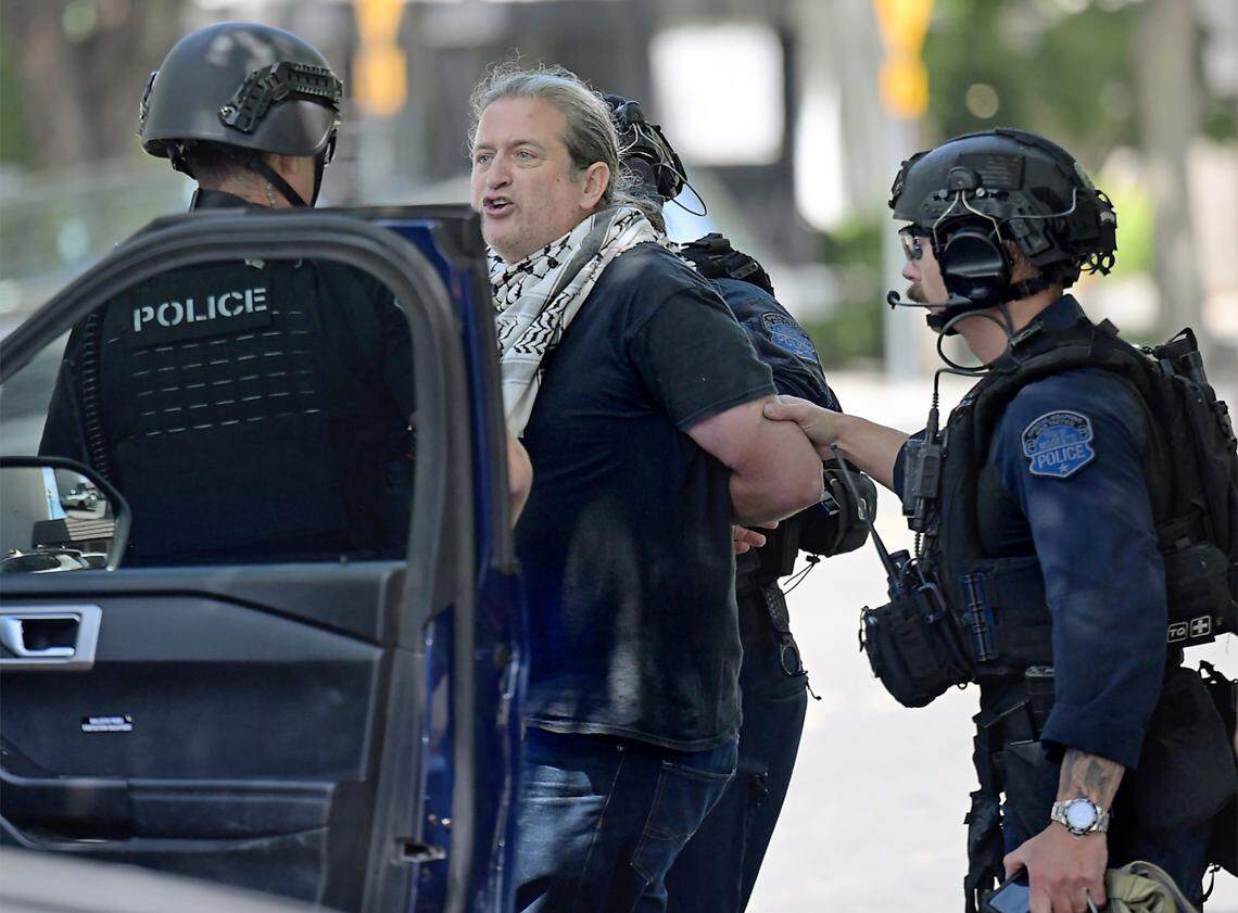 Stephen Allen was detained by Modesto Police before the start of the “No Kings” protest at Graceada Park in Modesto, Saturday, June 14, 2025.