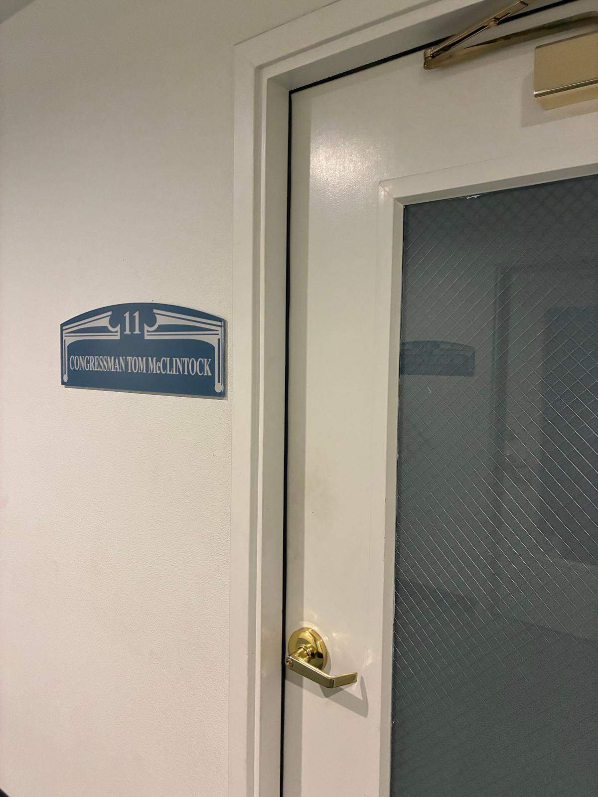 The closed door at Rep. Tom McClintock’s Modesto office located at 1020 15th Street in Modesto.