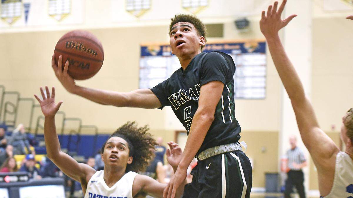 Pitman junior Josiah Frank attempts a layup during the first round of the Modesto City Classic at Gregori High School on Wednesday, Dec. 4, 2019.