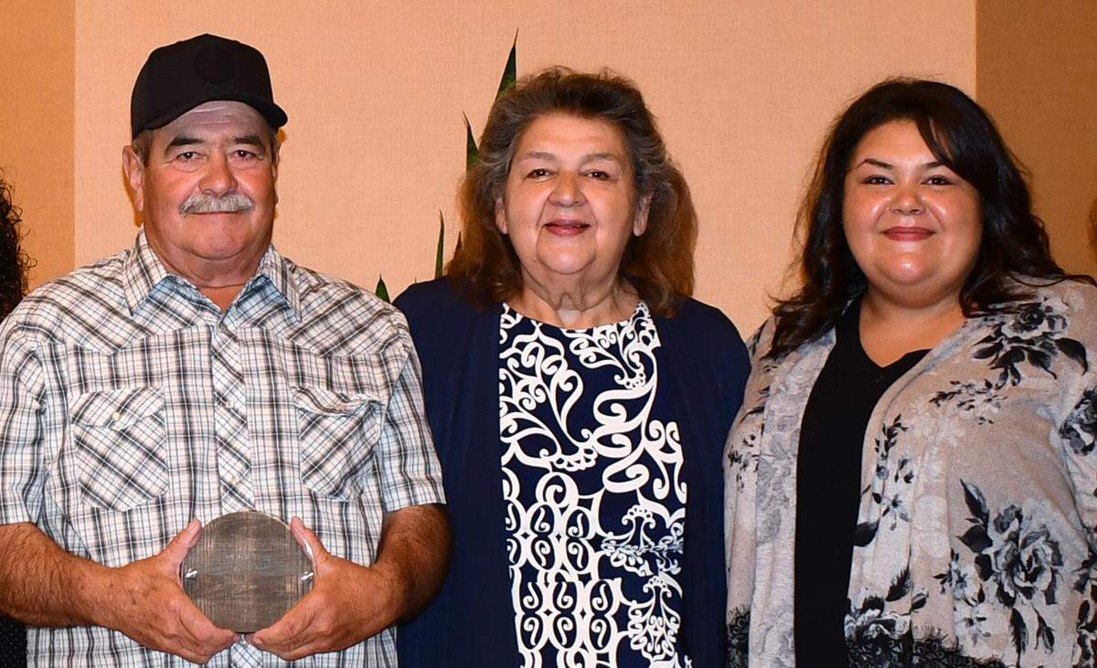 Gonzalo Torres received the Farmworker of the Year award for Stanislaus County on March 22, 2022. He was joined at the DoubleTree Hotel ceremony by wife, Rosalinda, and daughter Vanessa.