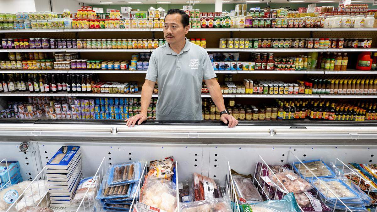 Asian Market owner Trong Vuong says imported seafood product prices have been affected by the recent tariffs. Photographed in Modesto, Wednesday, July 2, 2025.