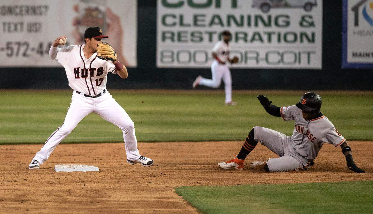Modesto’s Ben Ramirez forces out a San Jose runner during the opening day of baseball with at John Thurman Field in Modesto, Calif., on Friday, April 8, 2022. Modesto won the game 5-3.