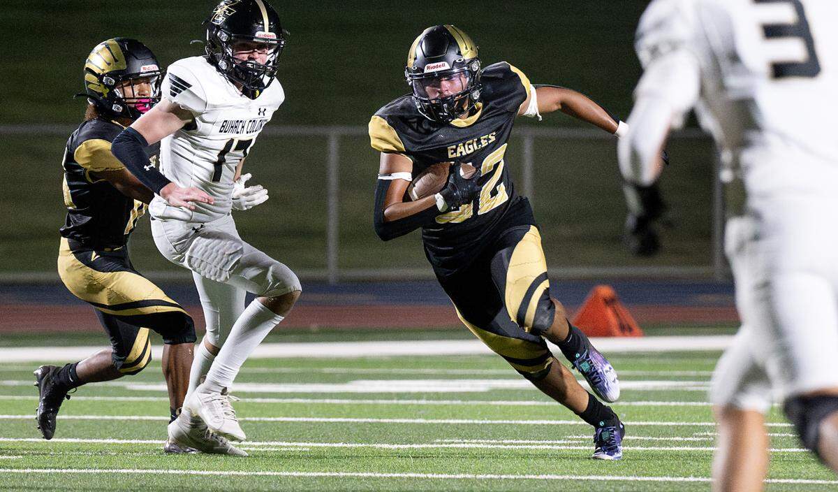 Enochs’ Kaedon Kopp runs the ball after a reception during the non-league game with Buhach Colony at Gregori High School in Salida, Calif., Friday, Sept. 1, 2023. The Eagles won the game 54-8.