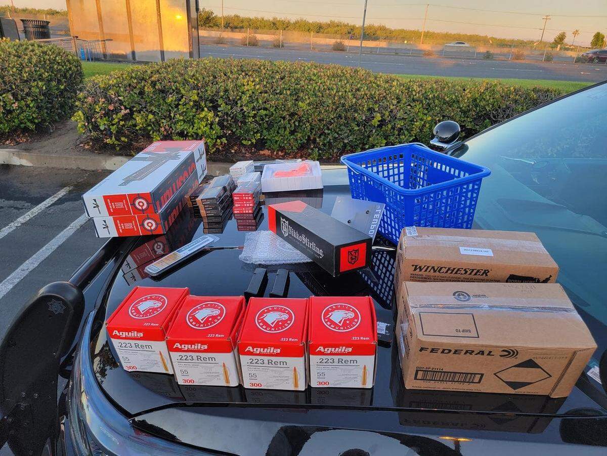 Weapons and ammunition stolen from Turner’s Outdoorsman on Plaza Parkway in Modesto are pictured after their recovery by police on Sunday morning, June 19, 2022.