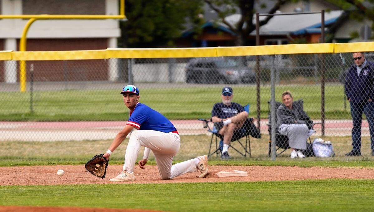 Beyer first baseman Rylan Gallegos attempts to pick a throw during the championship game of the Windemuth Tournament against Downey at Modesto High School on Thursday, April 24, 2025.