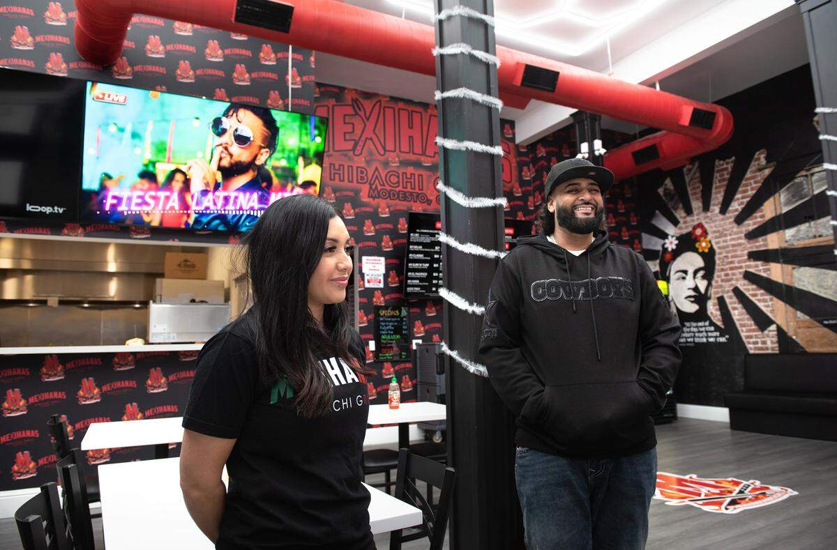 Owners Danielle and Ginn Sanghera at Mexihanas Hibachi Grill on J Street in Modesto, Calif., Thursday, Dec. 8, 2022.