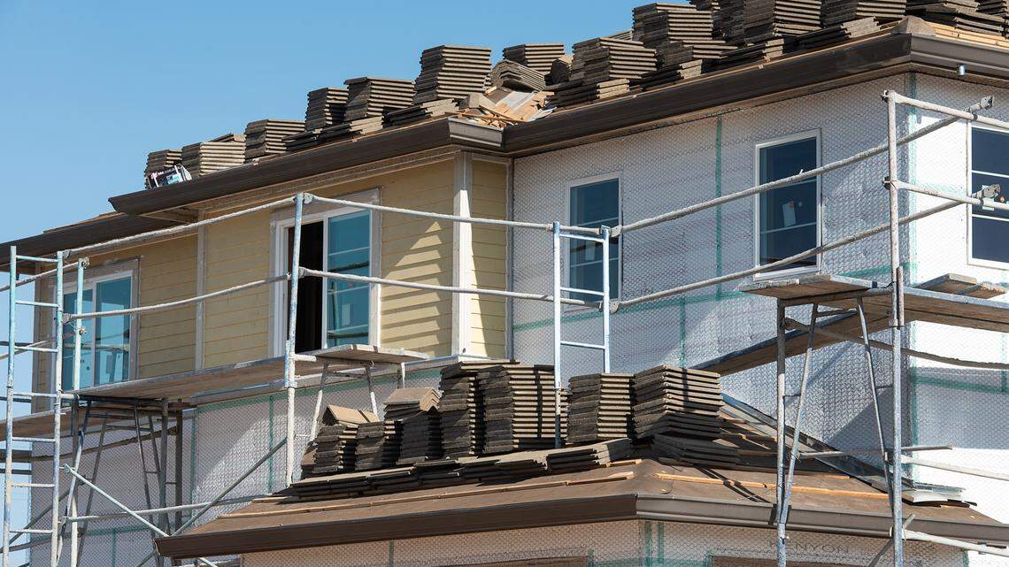 New homes are being constructed at The Trails in the Village One neighborhood in Modesto, Calif., on Friday, July 16, 2021.