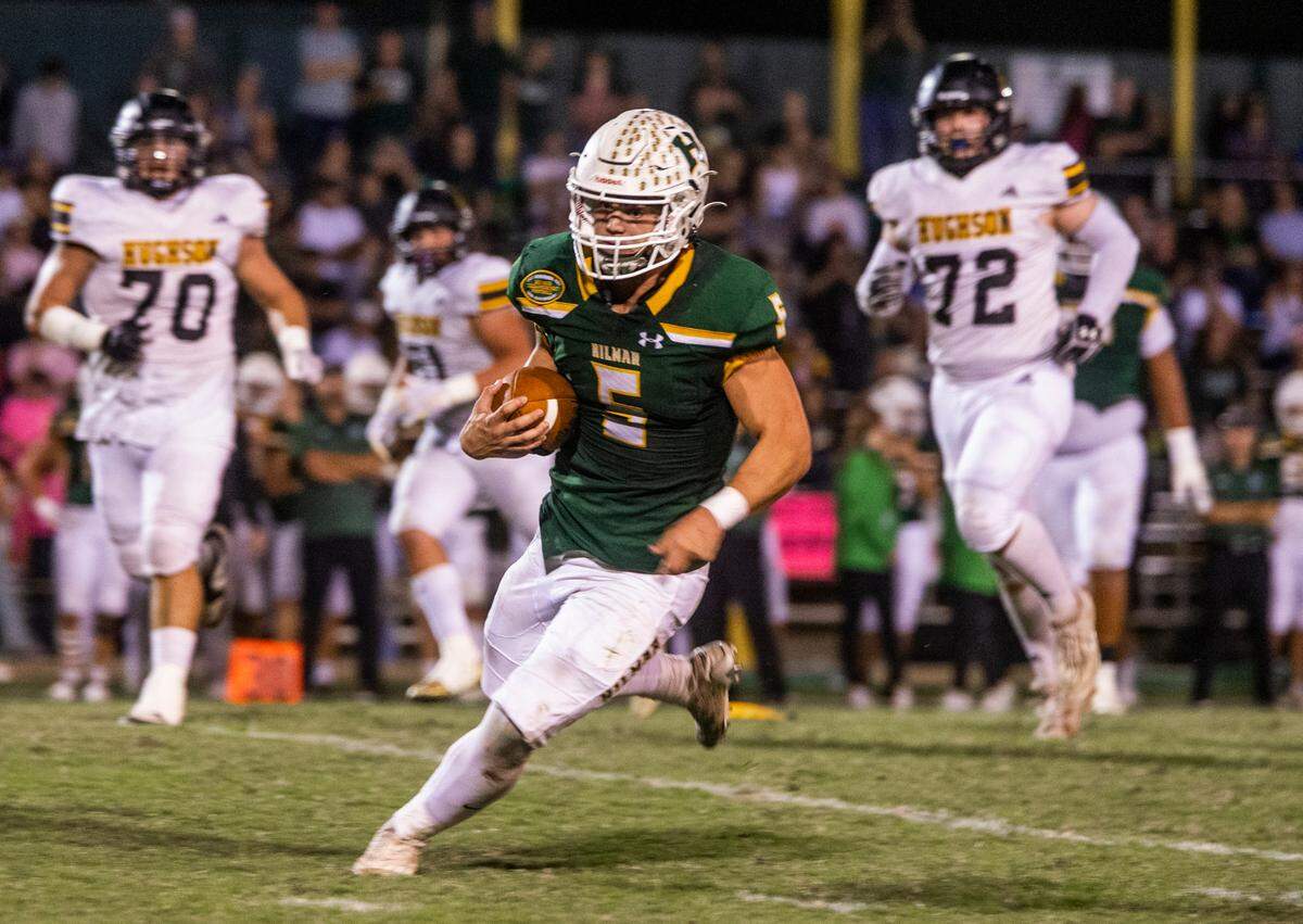 Logan Cardoso, 5, of Hilmar High works his way up field with Hughson Highs defense following Friday Oct. 20, 2023 night at Hilmar.
