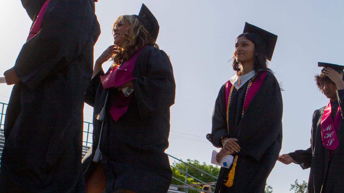 Seniors walk to the stage during the Modesto High School 2023 commencement, held at Modesto Junior College.