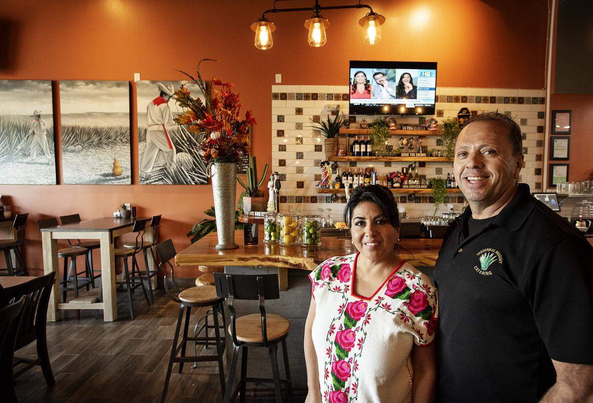 Owners Juan and Arcelia Jauregui at Taqueria El Maguey at Century Center in Modesto, Calif., Thursday, Nov. 21, 2019.