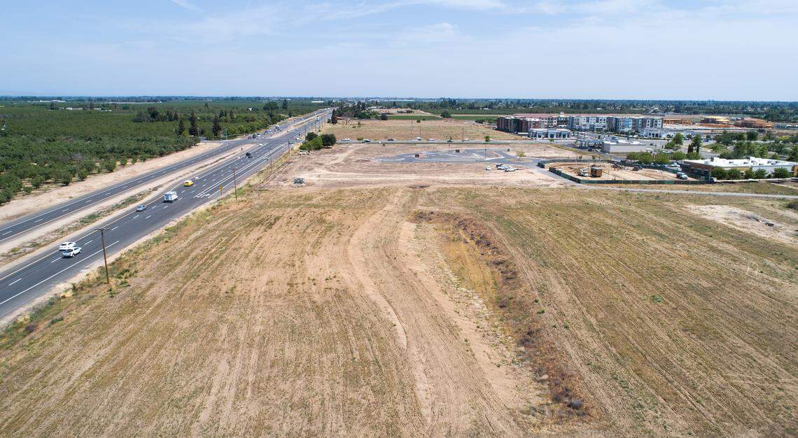 Site of The Hamptons Apartments development on Healthcare Way with Highway 219 on the left in Modesto, Calif., on Wednesday, April 27, 2022.
